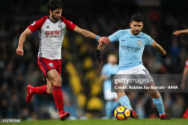 Claudio Jacob of West Bromwich Albion and Sergio Aguero of Manchester City during the Premier League match between Manchester City and West Bromwich...