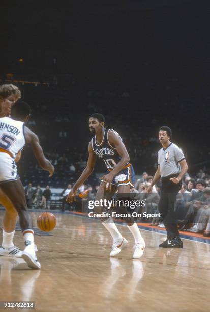 Norm Nixon of the San Diego Clippers dribbles the ball against the Washington Bullets during an NBA basketball game circa 1983 at the Capital Centre...