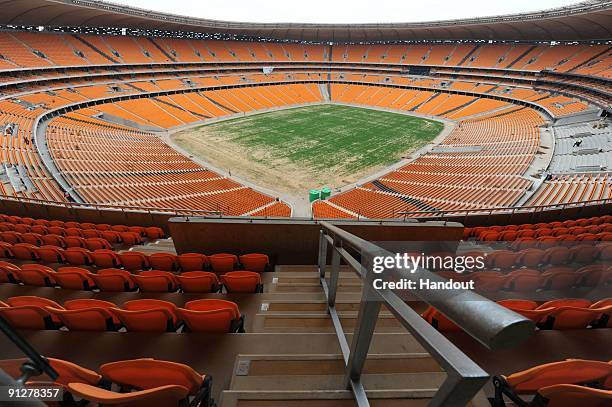 In this handout image provided by the 2010 FIFA World Cup Organising Committee South Africa, a general view of Soccer City Stadium on September 30,...