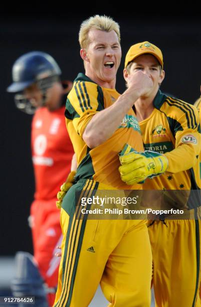 Brett Lee of Australia celebrates with Tim Paine after dismissing England's Andrew Strauss during the 1st NatWest Series One Day International...