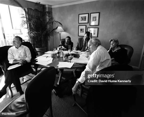 The morning after the election without a clear winner, vice presidential candidate Dick Cheney meets with campaign advisors and staff to discuss...