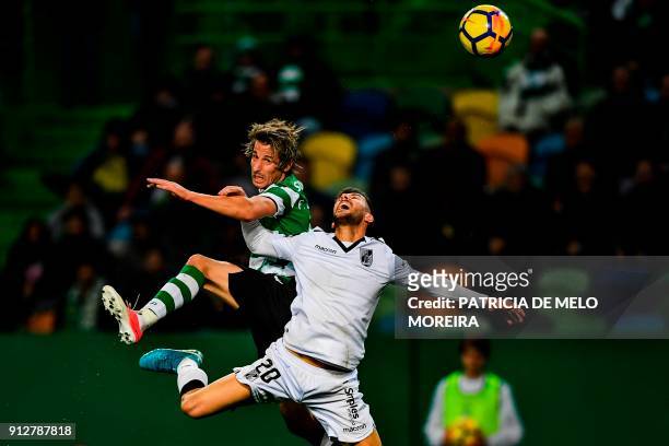 Sporting's defender Fabio Coentrao vies with Guimaraes' defender Joao Aurelio during the Portuguese league football match between Sporting CP and...