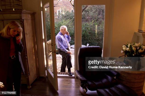 Vice Presidential candidate Dick Cheney talks on the phone at his home in McLean on November 28, 2000 as he begins work on heading up the transition...