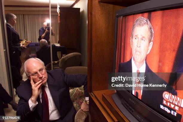 Vice President-elect Dick Cheney watches President-election George W Bush on CNN shorter after Vice President Al Gore concede the election on...