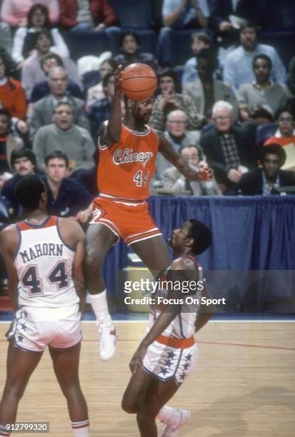 Quintin Dailey of the Chicago Bulls looks to pass the ball against the Washington Bullets during an NBA basketball game circa 1983 at the Capital...