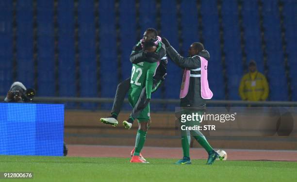 Nigeria's players celebrates the victory during their African Nations Championship semifinal match against Sudan at Marrakech Stadium on January 31...