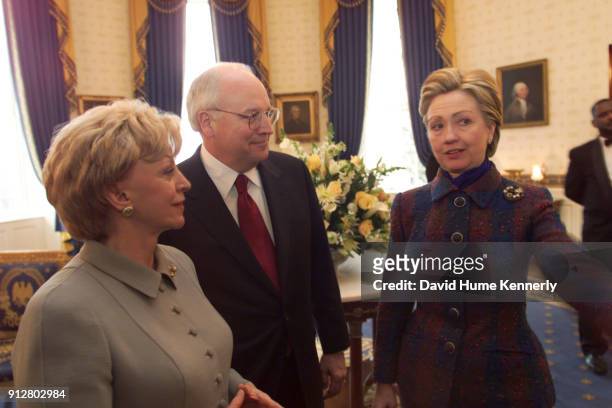 Lynne Cheney, Vice President elect Dick Cheney and First Lady Hillary Clinton talk at the White House before the swearing-in ceremony fo the new...