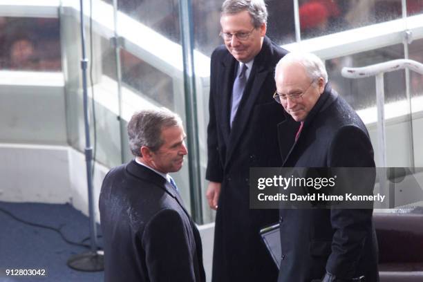 President George W Bush, Senate Mitch McConnell and Vice President Dick Cheney after the swearing in of the president in Washington, DC on January...