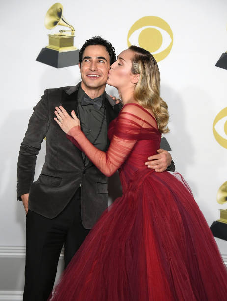 Zac Posen, Miley Cyrus poses at the 60th Annual GRAMMY Awards at Madison Square Garden on January 28, 2018 in New York City.