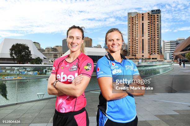 Ellyse Perry captain of the Sydney Sixers and Suzie Bates captain of the Adelaide Strikers pose on theAdelaide Footbridge during the Big Bash League...