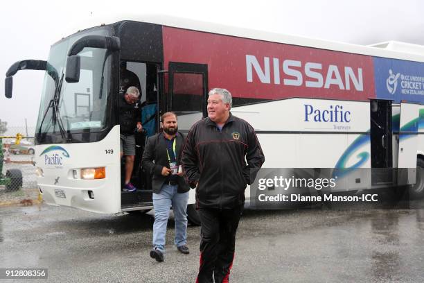 Andy Moles, coach of Afghanistan, arrives for lunch after the match was abandoned due to wet weather during the ICC U19 Cricket World Cup match...