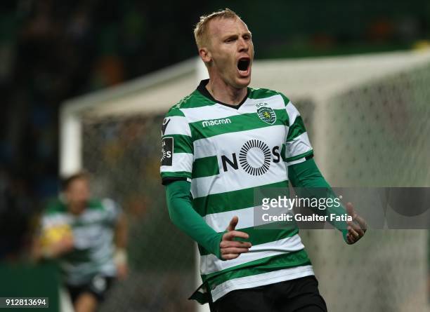 Sporting CP defender Jeremy Mathieu from France celebrates after scoring a goal during the Primeira Liga match between Sporting CP and Vitoria...