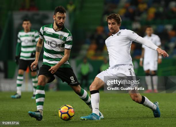 Vitoria Guimaraes midfielder Rafael Miranda from Brazil with Sporting CP midfielder Bruno Fernandes from Portugal in action during the Primeira Liga...