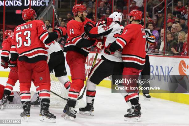 Carolina Hurricanes Defenceman Jaccob Slavin and Ottawa Senators Center Colin White pushing each other during the 2nd period of the Carolina...