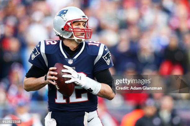 Tom Brady of the New England Patriots looks to pass during the AFC Championship Game at Gillette Stadium on January 21, 2018 in Foxborough,...