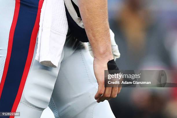 Detailed view of the right hand of Tom Brady of the New England Patriots during the AFC Championship Game at Gillette Stadium on January 21, 2018 in...