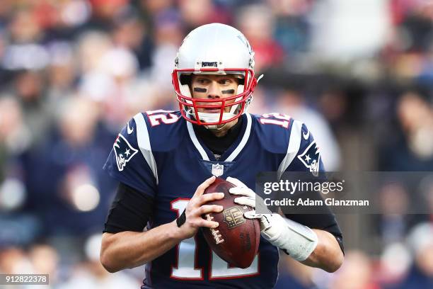 Tom Brady of the New England Patriots looks to pass during the AFC Championship Game at Gillette Stadium on January 21, 2018 in Foxborough,...