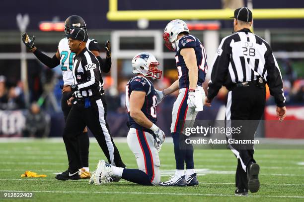 Rob Gronkowski of the New England Patriots reacts after an injury in the second quarter during the AFC Championship Game against the Jacksonville...