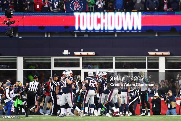 Tom Brady of the New England Patriots reacts after a touchdown in the second quarter during the AFC Championship Game against the Jacksonville...