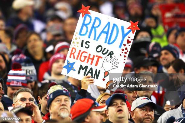 Fans display a sign for Tom Brady of the New England Patriots during the AFC Championship Game between the New England Patriots and the Jacksonville...