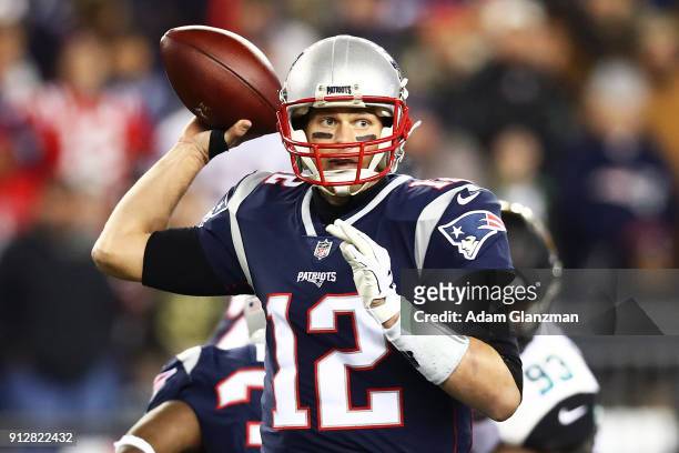Tom Brady of the New England Patriots throws in the second half during the AFC Championship Game against the Jacksonville Jaguars at Gillette Stadium...