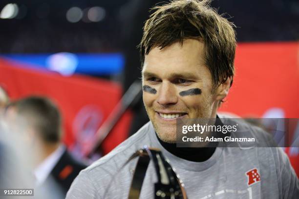 Tom Brady of the New England Patriots reacts after winning the AFC Championship Game against the Jacksonville Jaguars at Gillette Stadium on January...