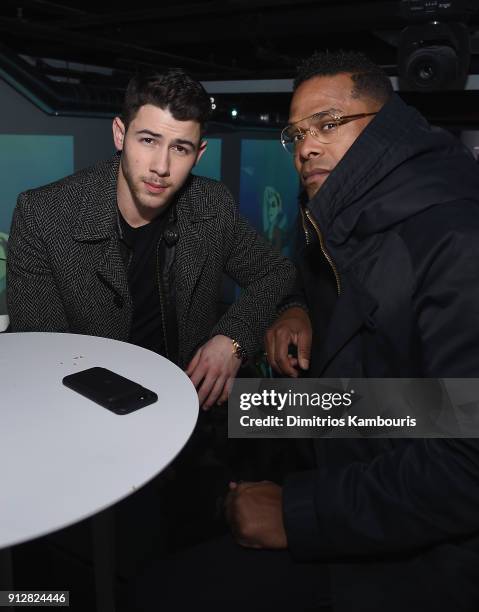 Nick Jonas and Maxwell attend "The Minefield Girl" Audio Visual Book Launch at Lightbox on January 31, 2018 in New York City.