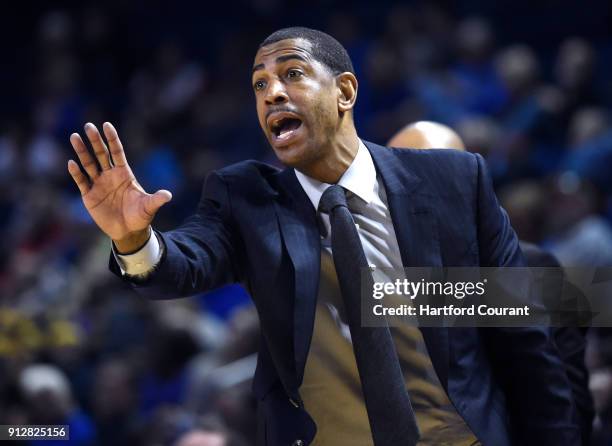 Connecticut head coach Kevin Ollie has instructions for his team against Tulsa at Reynolds Center in Tulsa, Okla., on January 3, 2018.