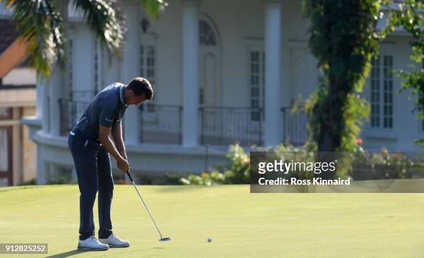 Chris Hanson of England on the 14th green during the first round of the Maybank Championship Malaysia at Saujana Golf and Country Club on February 1,...