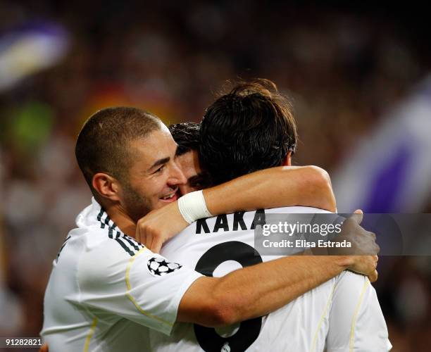 Cristiano Ronaldo of Real Madrid celebrates with his team mates Karim Benzema and Kaka during the UEFA Champions League Group C match between Real...