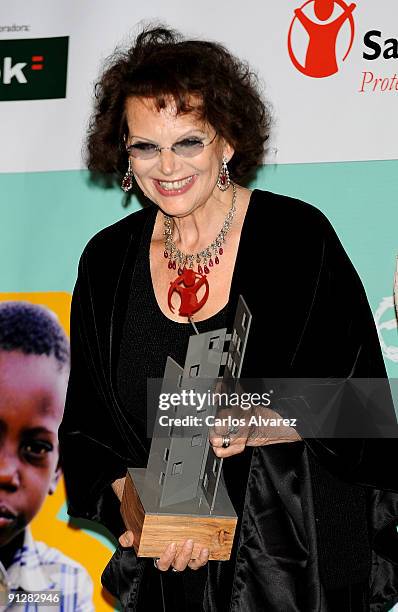 Actress Claudia Cardinale receives "Amigo de los Ninos" award during "Save the Children" ceremony awards at Círculo de Bellas Artes on September 30,...