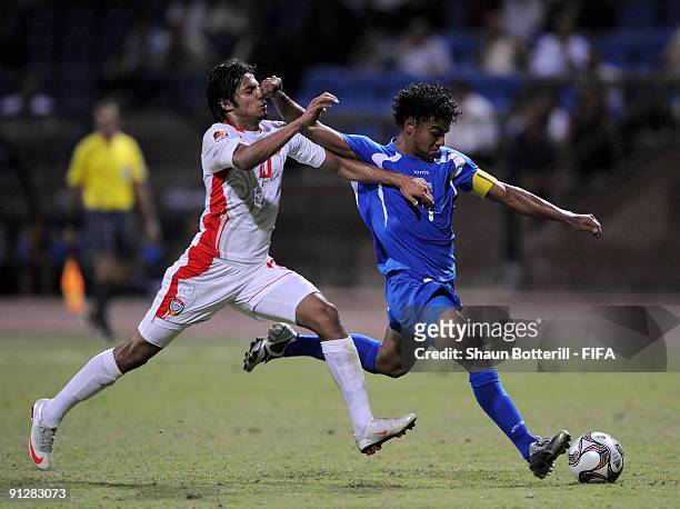 Mario Martinez of Honduras is challenged by Theyab Awana of United Arab Emirates during the FIFA U20 World Cup Group F match between United Arab...