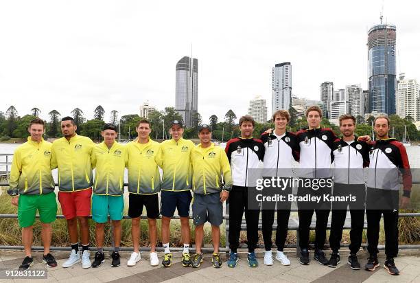 The Australian and German teams pose for a photo during the official draw ahead of the Davis Cup World Group First Round tie between Australia and...