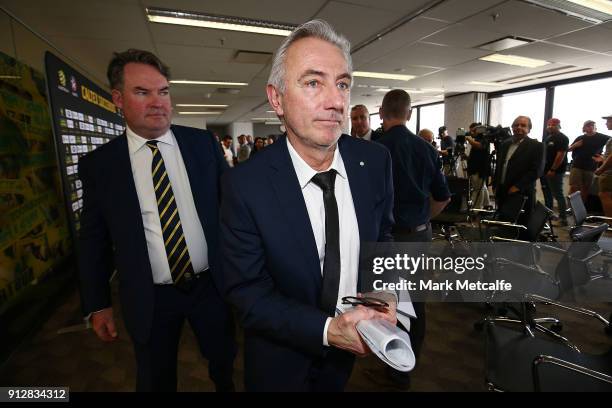 New Socceroos Head Coach Bert van Marwijk departs a press conference at FFA Headquarters on February 1, 2018 in Sydney, Australia.