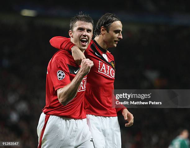 Michael Carrick of Manchester United celebrates scoring their second goal during the UEFA Champions League match between Manchester United and...