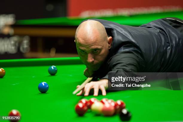 Joe Perry of England plays a shot in his first round match against Yu Delu of China on day one of 2018 D88 German Masters at Tempodrom on January 31,...