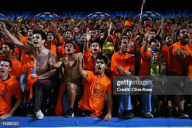 Fans cheer their team on during the UEFA Champions League Group D match between Apoel Nicosia and Chelsea at the GSP Stadium on September 30, 2009 in...