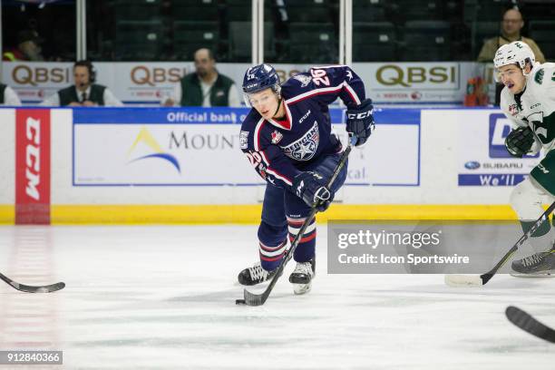 Tri-City Americans forward Riley Sawchuk caries the puck to center ice in a game between the Everett Silvertips and the Tri-City Americans on Monday,...