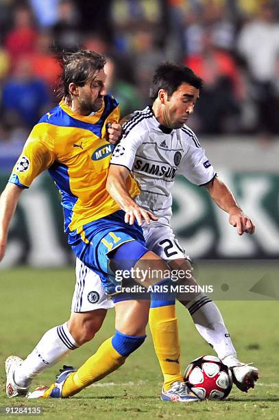 Chelsea's Deco fights for the ball with Kamil Kosovski of APOEL during their Champions League football match at the GSP stadium in the Cypriot...