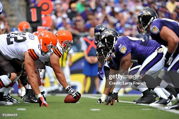 Alex Mack of the Cleveland Browns snaps the ball against the Baltimore Ravens at M&T Bank Stadium on September 27, 2009 in Baltimore, Maryland. The...