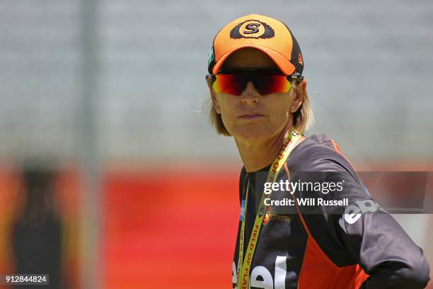 Lisa Keightley, head coach of the Scorchers watches the team warm up before the Women's Big Bash League match between the Sydney Thunder and the...