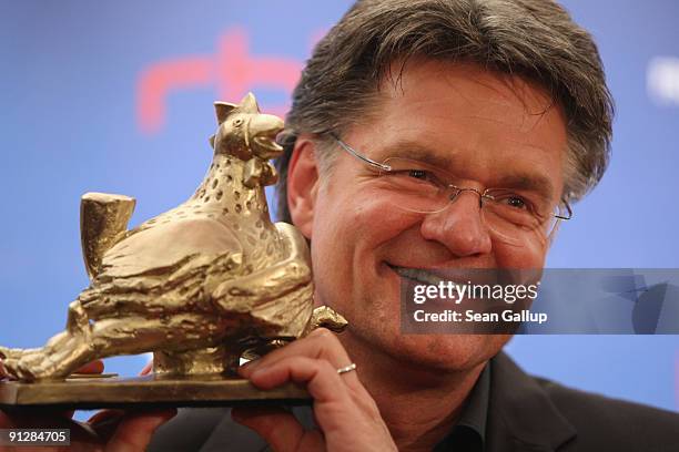 Television presenter Peter Escher holds his Goldene Henne Award at the Goldene Henne 2009 awards at Friedrichstadtpalast on September 30, 2009 in...