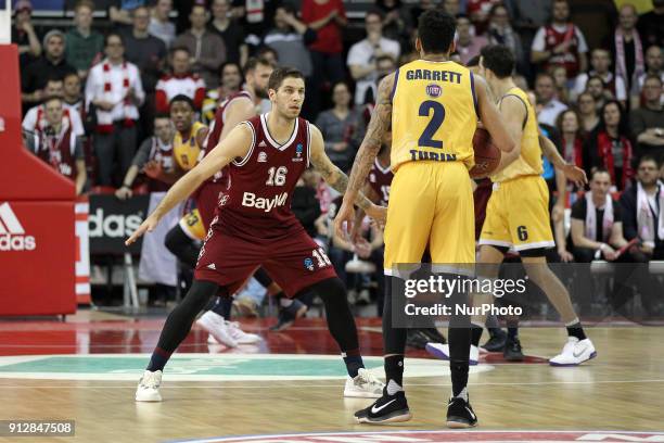 Stefan Jovic of Bayern Muenchen vies Diante Garrett of Fiat Turin during the EuroCup Top 16 Round 5 match between FC Bayern Munich and Fiat Turin at...