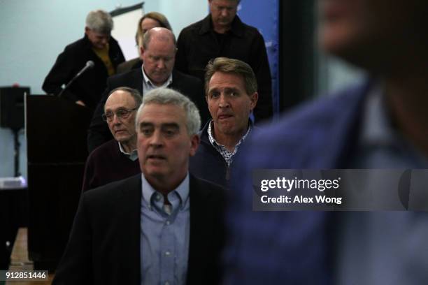 Rep. Phil Roe , Rep. Brad Wenstrup , Sen. Jeff Flake leave after a news briefing with other GOP lawmakers to discuss their train accident while they...