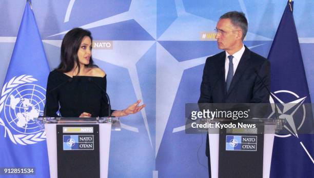 Actress Angelina Jolie , a special envoy for the U.N. High Commissioner for Refugees, and North Atlantic Treaty Organization Secretary General Jens...
