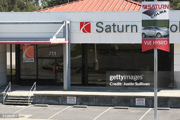 The sales lot of the closed Saturn of Colma dealership sits empty September 30, 2009 in Colma, California. General Motors announced today that they...