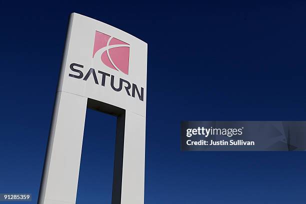 Signage remains on the sales lot of the closed Saturn of Colma dealership September 30, 2009 in Colma, California. General Motors announced today...