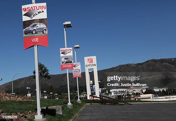 The sales lot of the closed Saturn of Colma dealership sits empty September 30, 2009 in Colma, California. General Motors announced today that they...