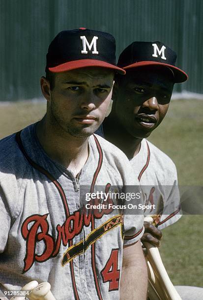 Third baseman Eddie Mathews and outfielder Hank Aaron of the Milwaukee Braves pose together for this photo during spring training baseball circa...