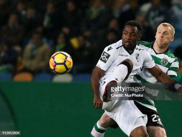 Sporting's defender Jeremy Mathieu vies with Guimaraes's forward Junior Tallo during the Portuguese League football match between Sporting CP and...